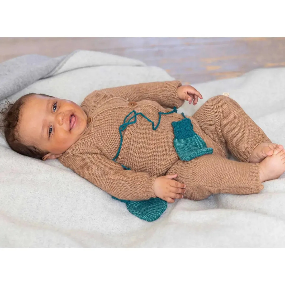 Disana combinaison laine mérinos tricotée bébé