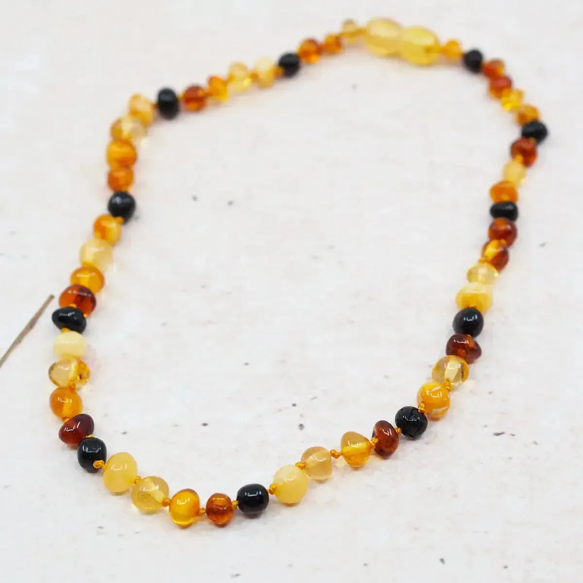 LiliNappy Baroque collier d’ambre bébé sécurisé
