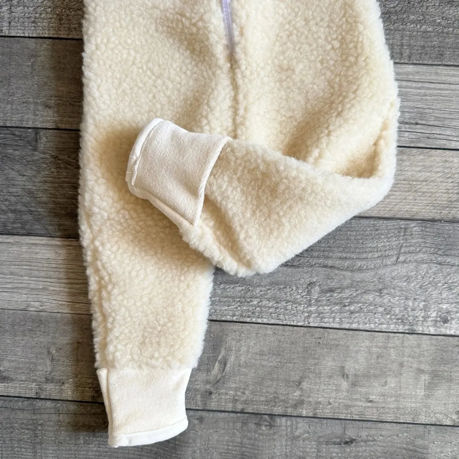 Combinaison Sassoupi laine vierge bébé capuche