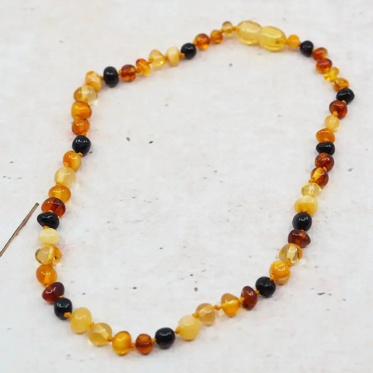 LiliNappy Baroque collier d’ambre bébé sécurisé